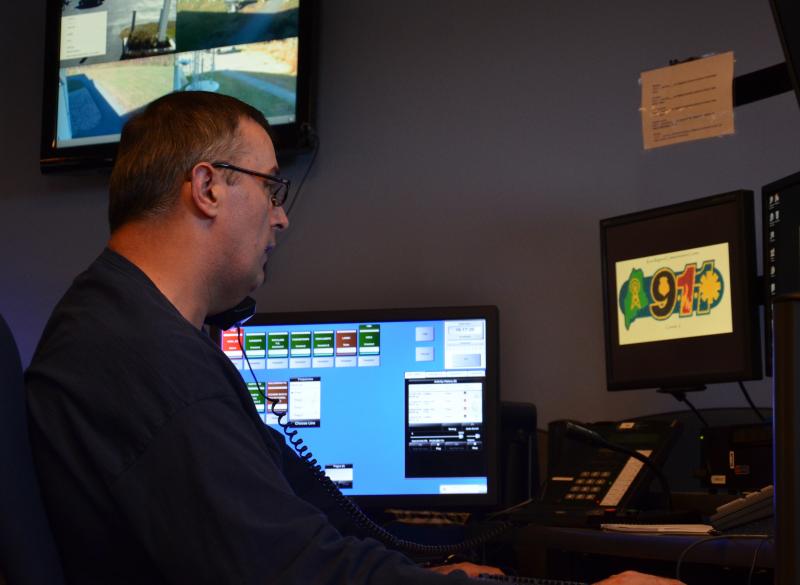 Knox Country Regional Communications Center Emergency Dispatcher John Gamage at work. (Photo by Lynda Clancy)
