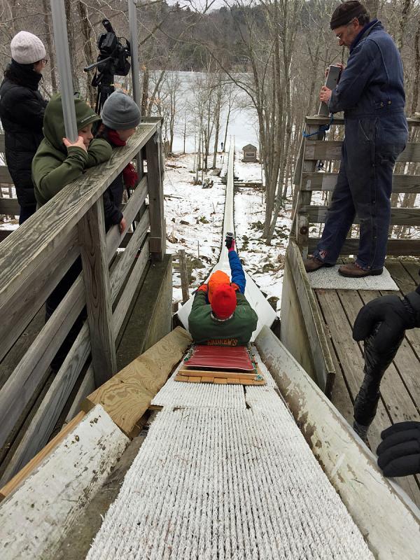 Sliding out into the chute... (Photo by Holly S. Edwards)