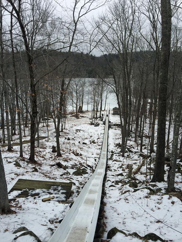 It’s a long way down the 440-foot-long, one-of-a-kind wooden toboggan chute, but all of Friday’s reporters and bloggers made it down and back up safely to report another day. (Photo by Holly S. Edwards)
