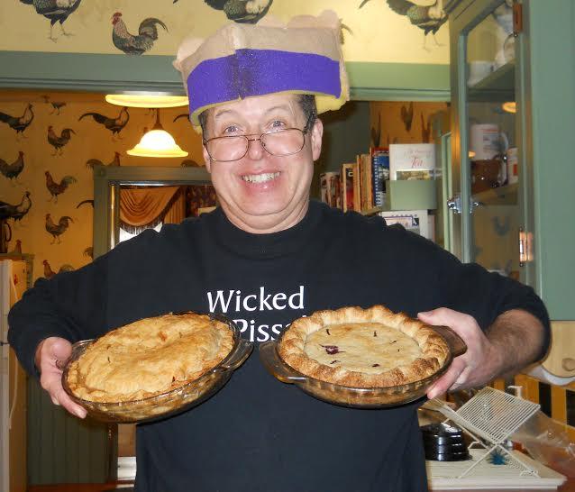 Mike LaPosta of Berry Manor Inn offers up pies during the Pies on Parade Tour. (Photo by Marti Mayne.)