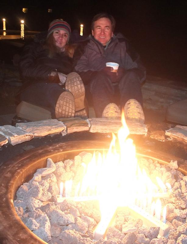 Jody and Bill Cowan warm their feet.