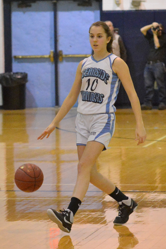 Oceanside’s Abby Veilleux brings the ball up the floor. (Photo by Ron Hawkes)