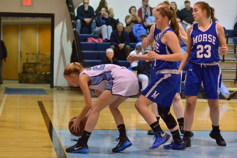Oceanside’s Jillian Brooks was called out of bounds on this play which caused a turnover. (Photo by Ron Hawkes)