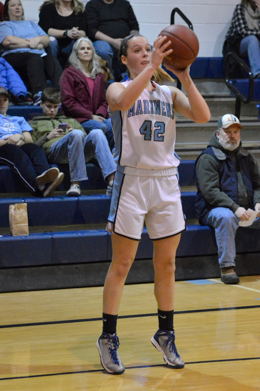 Oceanside’s Brianna Dugan takes a long shot from the baseline. (Photo by Ron Hawkes)