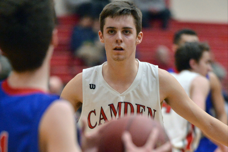 Camden Hills Dalton Oakes is focused on the ball on the inbounds play. (Photo by Ron Hawkes)