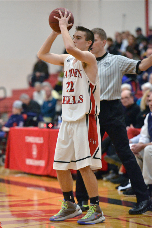Camden’s Noah Heidorn set to make a hard pass. (Photo by Ron Hawkes)