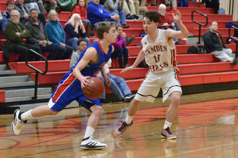 Mt. Ararat’s Cole Guerin, left, tries to get past Camden’s Gavin Boyd. (Photo by Ron Hawkes)