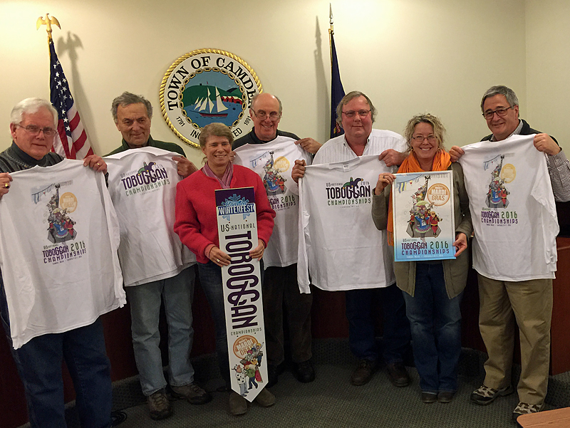 Displaying their 2016 U.S. National Toboggan Championships T-shirts, from left, are Camden Select Board members Don White and Leonard Lookner, co-presenter and Camden Development Director and Winterfest Committee member Karen Brace, Select Board member Jim Heard and chairman John French, co-presenter and Toboggan Championships Committee chairman Holly Edwards and Select Board member Martin Cates. (Photo by Steve Pixley)