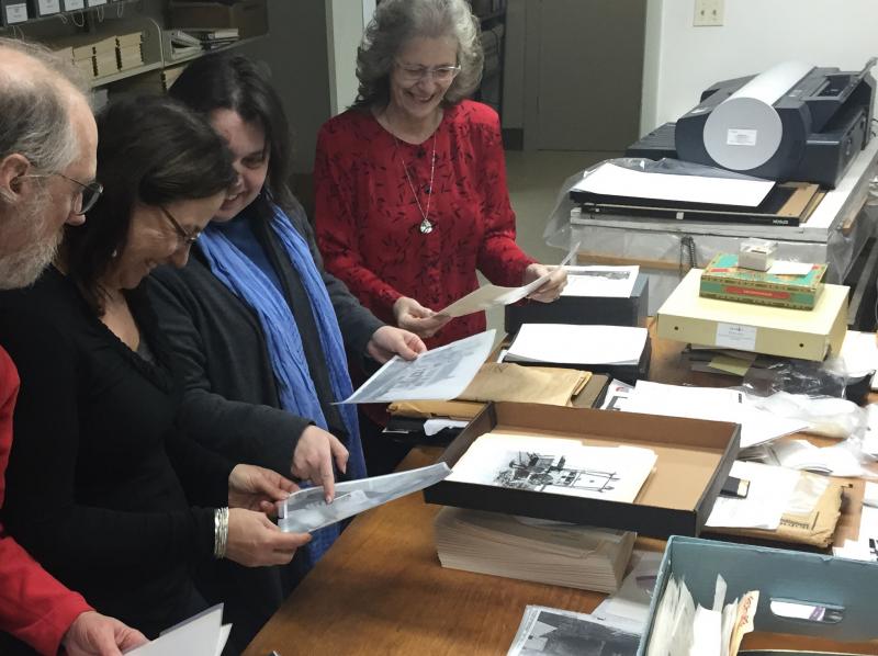 Rockport visits the Penobscot Marine Museum photographic archives in Searsport on Jan. 21 to gather images of Rockport over the centuries. in 2005, the Museum rescued the 37,000 images of Eastern Collection from Union Hall, in Rockport, and under the care of archivist Kevin Johnson, has been methodically scanning and preserving each glass-plated image for future generations. Here, Selectman Geoff Parker, Lynda Clancy, Rockport Executive Secretary Stacey Parra and Town Clerk Linda Greenlaw pore over the Edward Coffin collection of photos, which include even more images of Rockport.