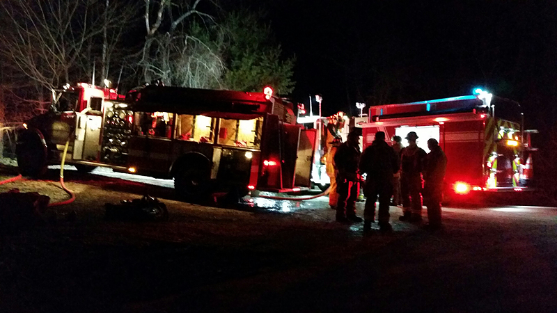 After the fire was under control, Rockport Fire Chief Jason Peasley said he allowed firefighters to go into the house and rescue a personal collection of guitars, valued at around $10,000 by the tenant. (Photo by Sarah Shepherd)