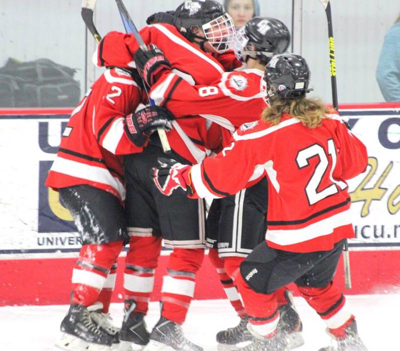Camden Hills Nick Czuchra (#2), Will Davee (#18), Cam Christie (#8), and Dan Lydon (#21) celebrate a Windjammer goal. (Photo Courtesy of Molly Cole)