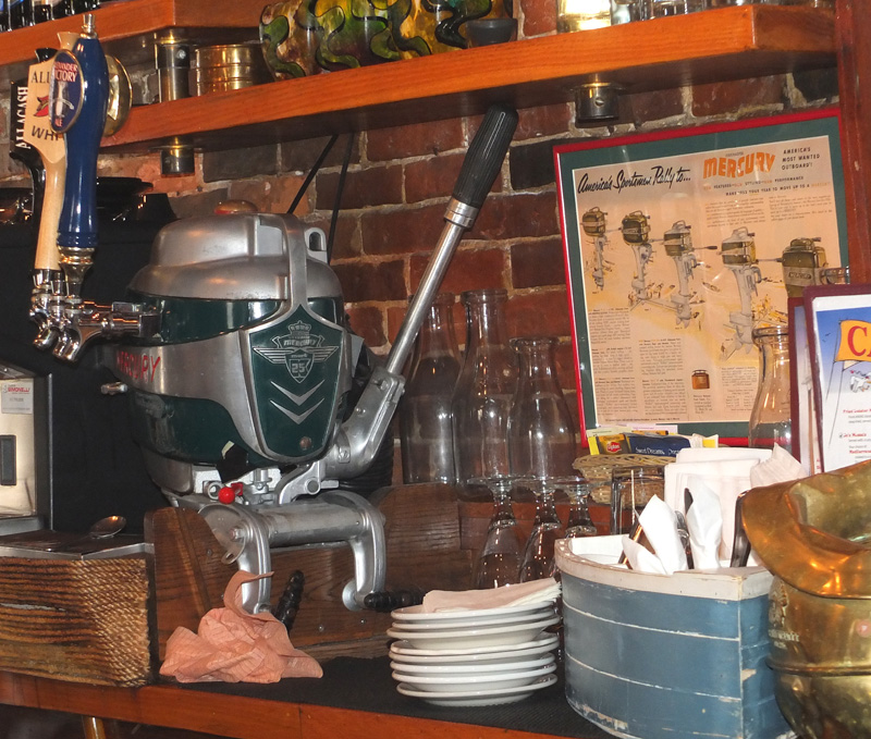 The signature outboard motor beer tap.