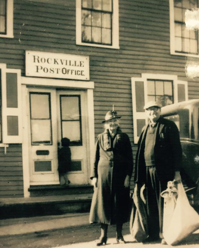 West Rockport Post Office, the last day it was open. The photo of Michael’ Payson’s Great Aunt Lottie Ewell getting the last mail delivery of the Rockville Post Office. That is his mother going in the store. This was the end of the Post Office.