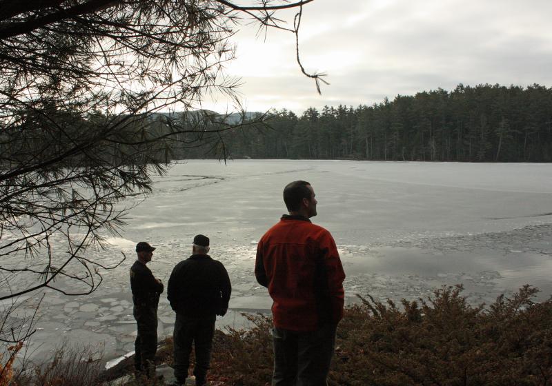 At 7:30 a.m. Tuesday, Maine game wardens and Lincolnville Fire Chief Ben Hazen gather back at Wiley Neck, where divers would eventually locate the body of Trueman Moore. (Photo by Holly S. Edwards)