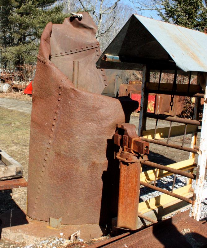 Jay Sawyer has been slowly working on this sculpture of what he has envisioned is a mother and child. The steel was salvaged from the American Can Company in 2013. (Photo by Holly S. Edwards)