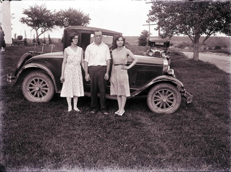 Two Women, One Man and a Model A