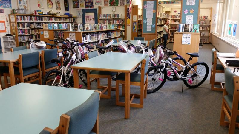 The bikes were stored in the school’s library until classes were dismissed.
