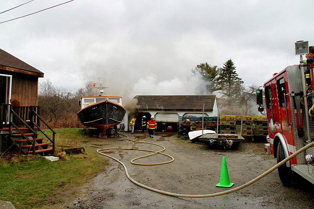 The chicken coop, which was destroyed in the fire, was located behind the garage/workshop, which also sustained some fire, water and smoke damage. (Courtesy Rockland Fire Department/by Alan Athearn)