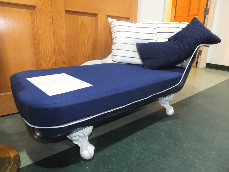 The claw foot settee sold during the silent auction.