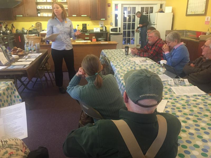 Event-goers listen to Jennifer Albee of ReVision Energy speak at Morris Farm in Wiscasset on April 2. SUSAN JOHNS/Wiscasset Newspaper