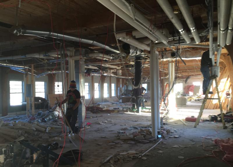 Demolishing the inside of the Knox Mill top floor, February 2016, 20-plus years after it had been renovated as corporate offices. Next incarnation: apartments. (Photo by Lynda Clancy)