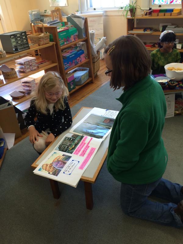 Parent Jennifer Temple and Student Stephanie Altschul with her scrapbook of her "trip" to Italy
