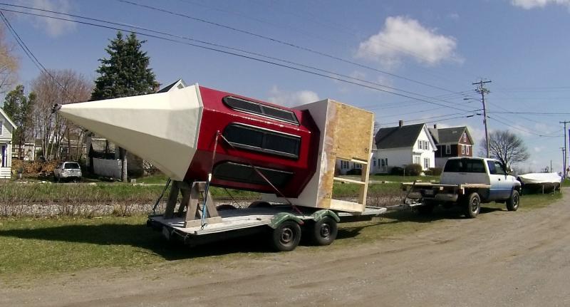 From the ground to the top of the building, a new steeple gets set into place.