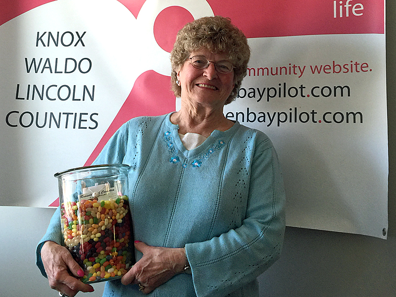 Jackie Harjula of Thomaston had the best guess of how many Jelly Belly jelly beans were in the jar at the PenBayPilot.com booth at the April 13 PenBay Chamber Business. She not only took home 3,312 sweet beans, she won a beautiful sterling silver urchin and diamond pendant necklace, courtesy of Russell’s of Camden Fine Jewelry. (Photo by Holly S. Edwards)