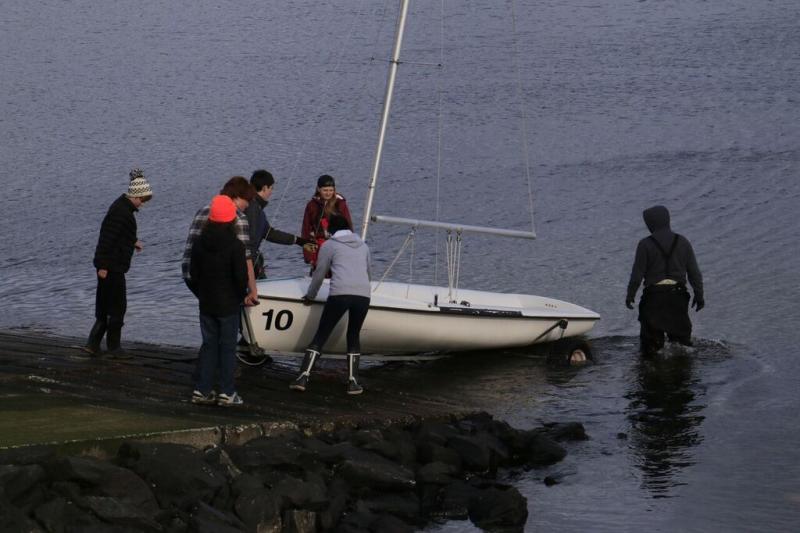 Rigging, launching, and Sailing Collegiate 420s. One design fleet boats used by high schools and college sailing teams. (Photo Courtesy of David Lyman)