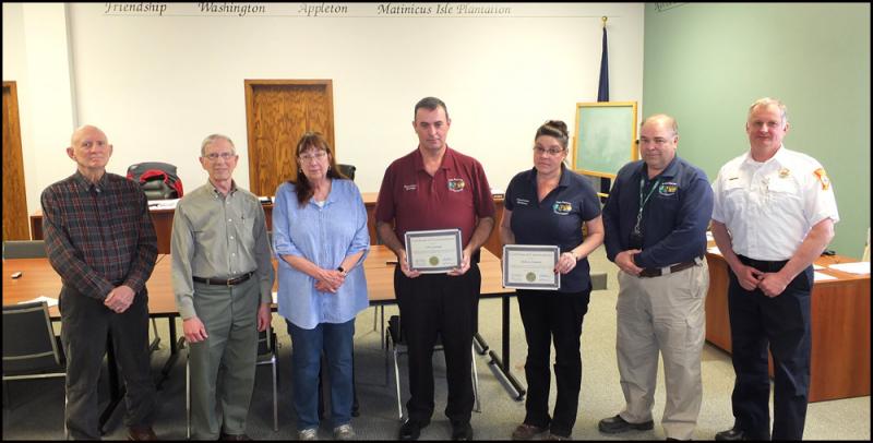 Knox dispatchers receive commendations from Knox County Commissioners. L to R: Rick Parent Jr., Roger Moody, Carol Maines, John Gamage, Melissa Simmons, Linwood Lothrop and Camden Fire Chief Chris Farley. (Photos by Chris Wolf)