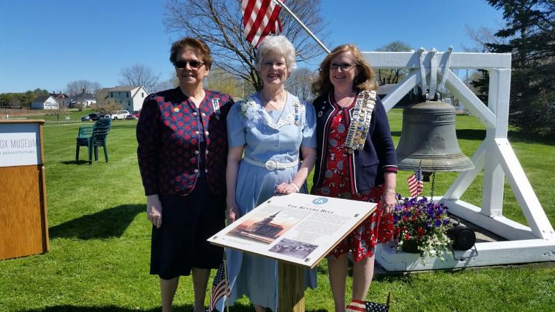 Suzy Shaub, Chapter Regent, (middle) stands behind the dedicated sign with Joanne Richards (left), chapter member and MaryKay Felton, incoming Regent of the Lady Knox Chapter. (Photo by Sarah Shepherd)
