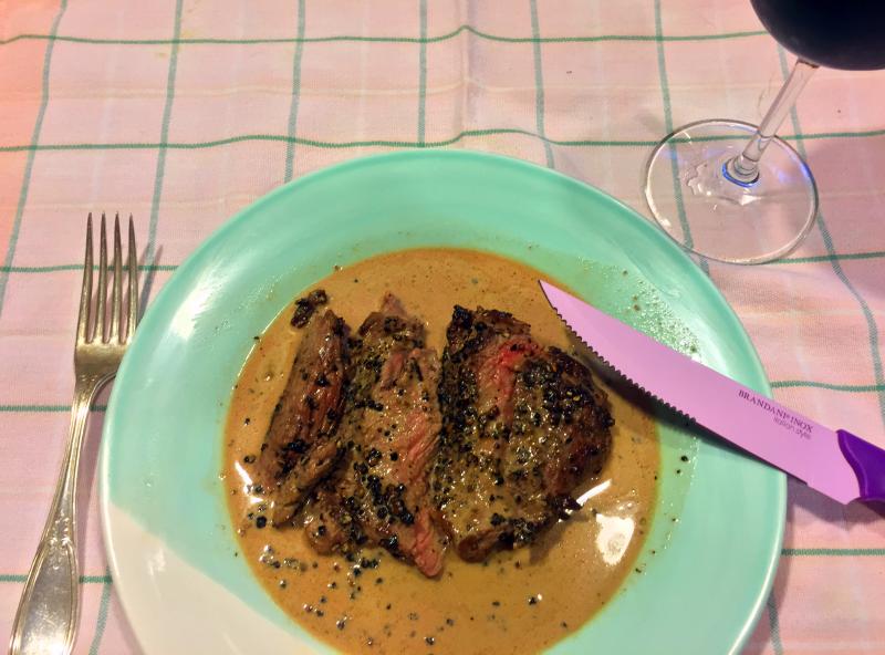 Steak au poivre and a glass of wine. Hello. SUZI THAYER/Boothbay Register