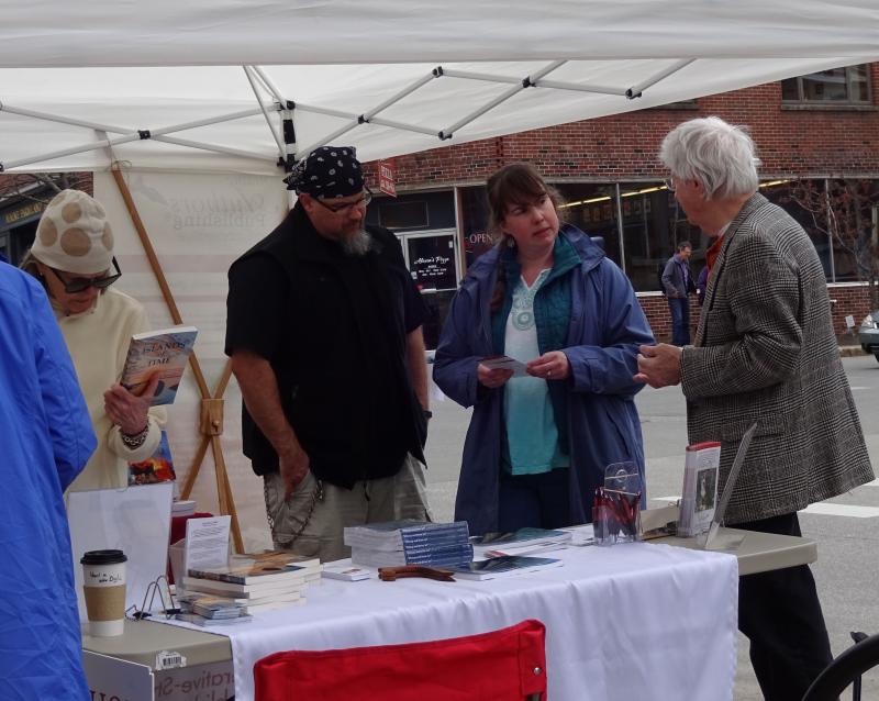 David Estey, author of “Whoop and Driver,” talks with a fan. (photo by Erica Thoms)