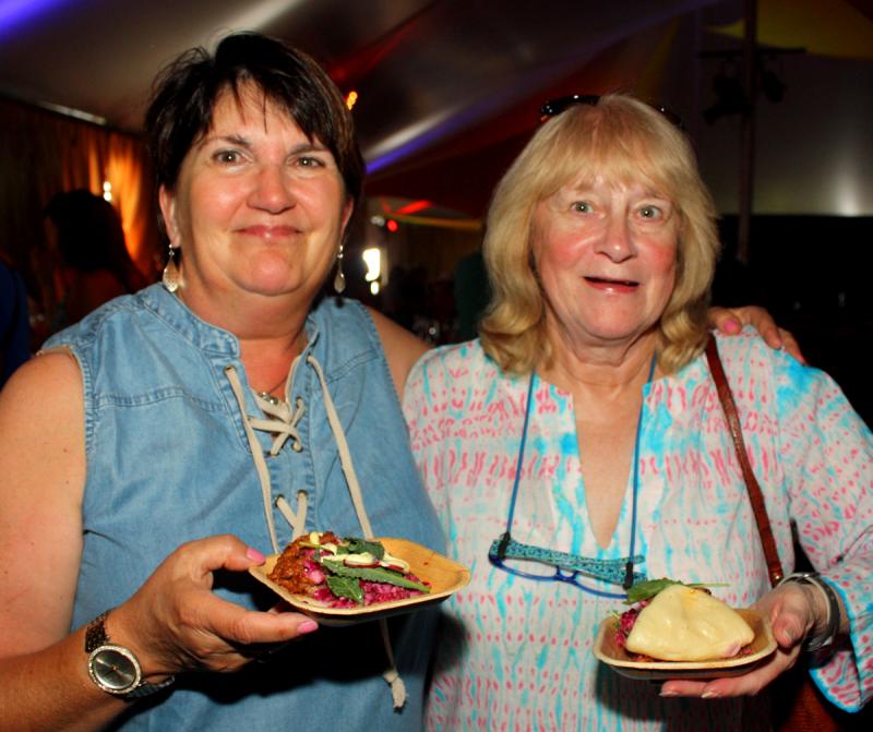 Enjoying the food and the festivities. (Photo by Holly S. Edwards)