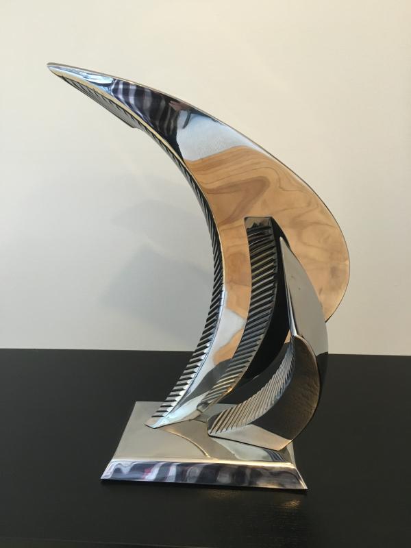 Spirit of Tradition trophy to be presented by Stephens Waring Yacht Design of Belfast. Designed and fabricated by Keith Maynard, of Belfast, the free-form 20-inch-tall, stainless steel sculpture is inspired by sail and will be mounted on granite.