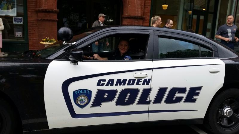 Brook Hartshorn, Camden Police officer, drives the lead car for the torch run. (Photo by Sarah Shepherd)