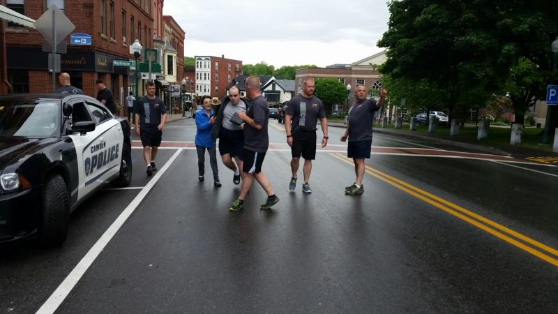 The runners took off for the annual Law Enforcement Torch Run with Graham Wiley carrying the torch. (Photo by Sarah Shepherd)