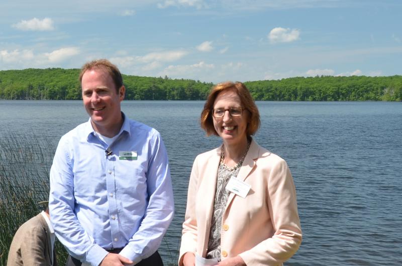 Coastal Mountains Land Trust Executive Director Ian Stewart and Maine Water President Judy Wallingford, on the shore of Grassy Pond in Rockport. (Photo by Lynda Clancy)