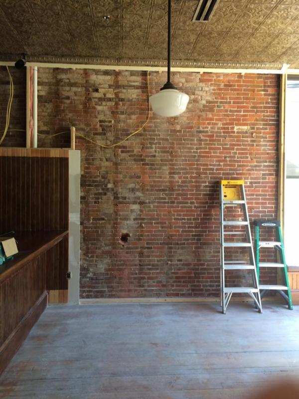 Ripping off the sheetrock revealed exposed brick walls. (Photo courtesy 18 Central Oyster Bar & Grill)