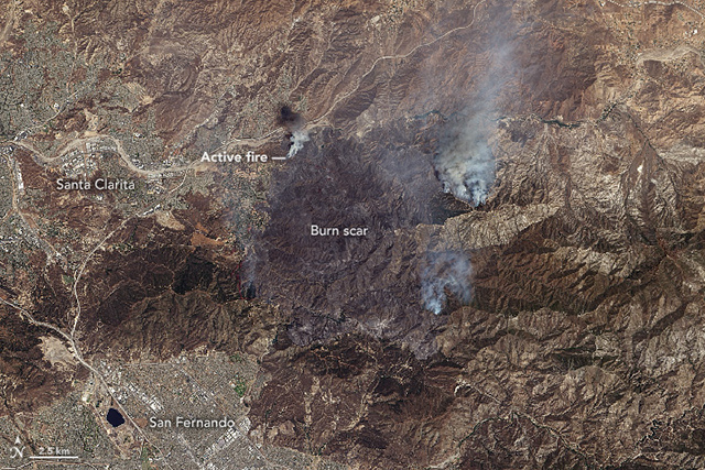 An image of the Sand wildfire, taken on July 24, using NASA's Landsat 8 satellite, shows the extensive effects that the fire has already had on the landscape (Courtesy NASA Earth Observatory/Image by Jesse Allen)