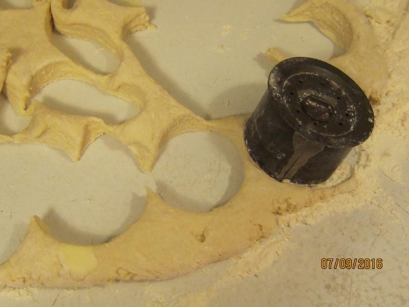 A special cutter or even a soup can works to cut out the biscuits cutting