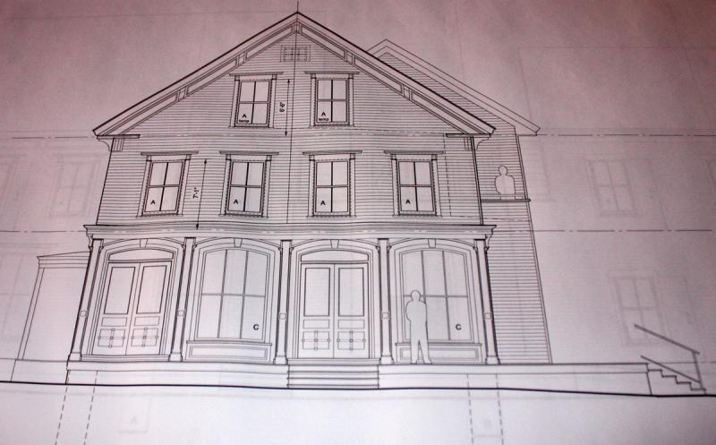 A rendering of the front of the new Lincolnville Center General Store, showing a porch where people can sit and socialize. (Photo by Holly S. Edwards)