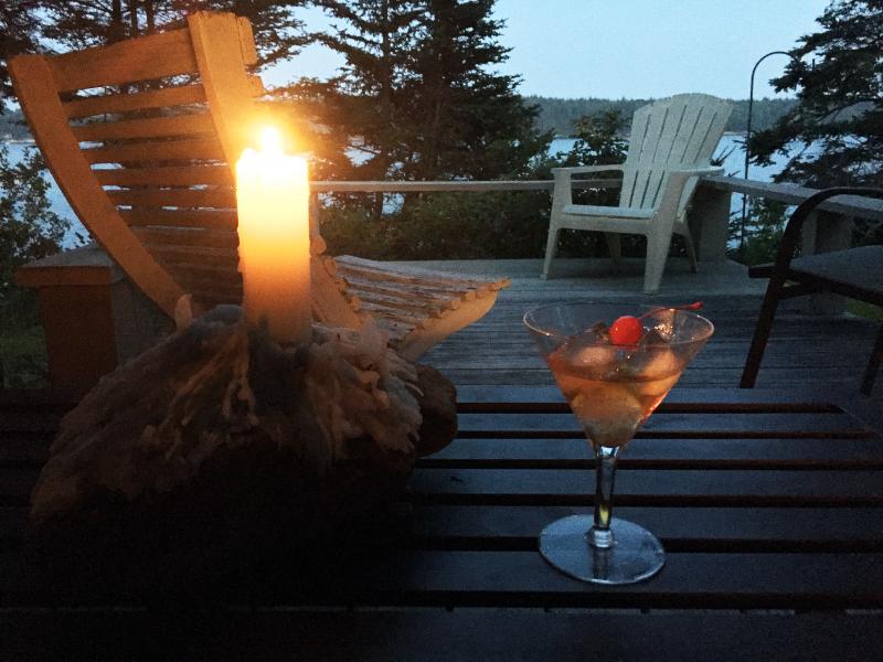 An evening on the deck at the cottage on Bird Point, Cushing. SUZI THAYER/Boothbay Register