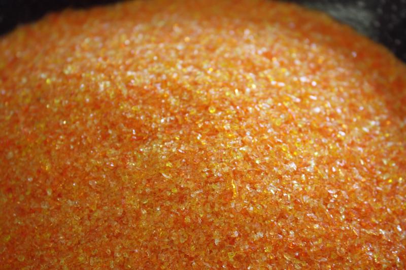 Close up of a pan of colored frit. (Photo by Holly S. Edwards)