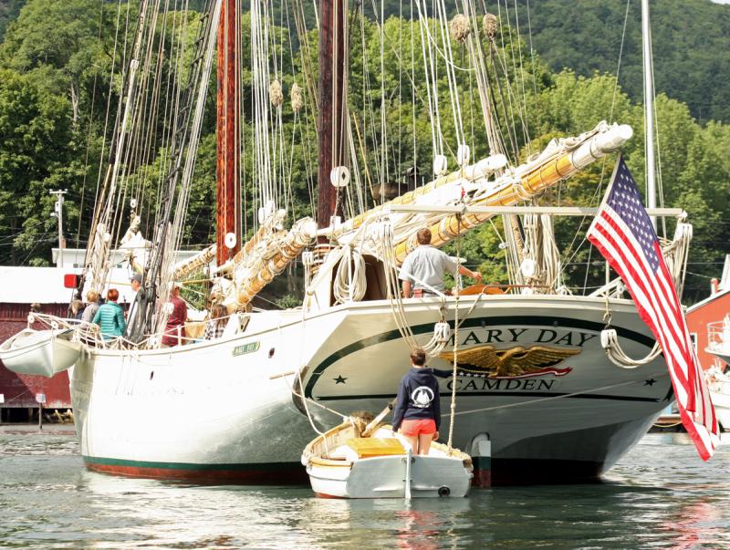 Getting back to business, Capt. Barry King and his crew bring the schooner Mary Day into her berth at the head of Camden Harbor. (Photo by Holly S. Edwards)