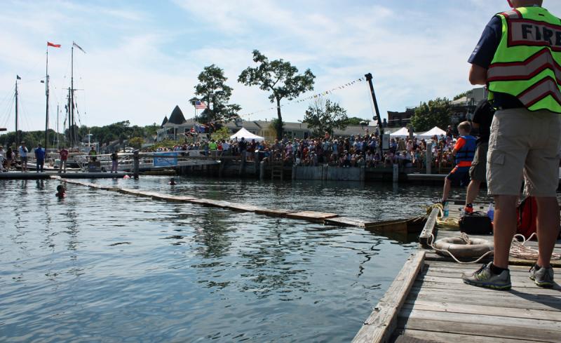 The Lobster Crate Race course consists of 27 crates filled with seaweed for buoyancy and a pair of firefighters in the water to assist racers if they need it. (Photo by Holly S. Edwards)