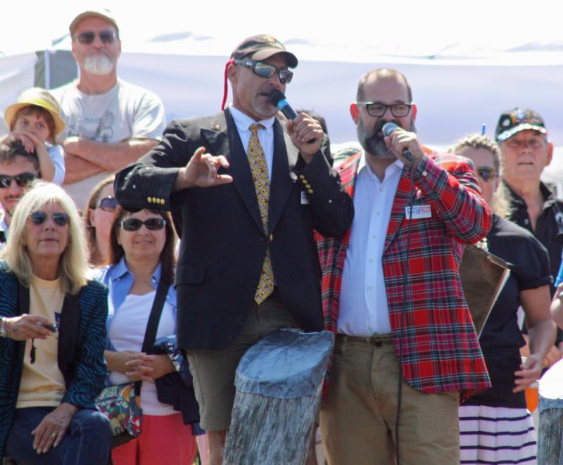 Camden Harbormaster Steve Pixley, left, and Lobster Crate Race organizer Seth Silverton, each year provide colorful running commentary during the race. (Photo by Holly S. Edwards)