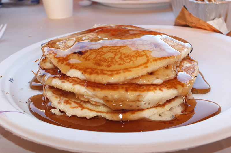 Smothered in maple syrup and packed with blueberries, you had your choice of two or three pancakes.