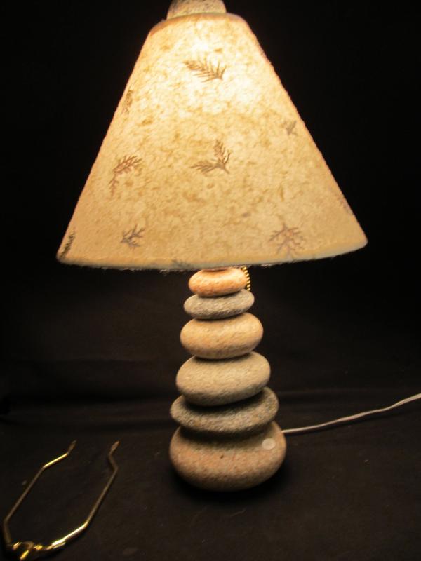 One of Guido’s original designs, the stacked stone lamp with handmade paper lamp shade.(Photo by Kay Stephens)