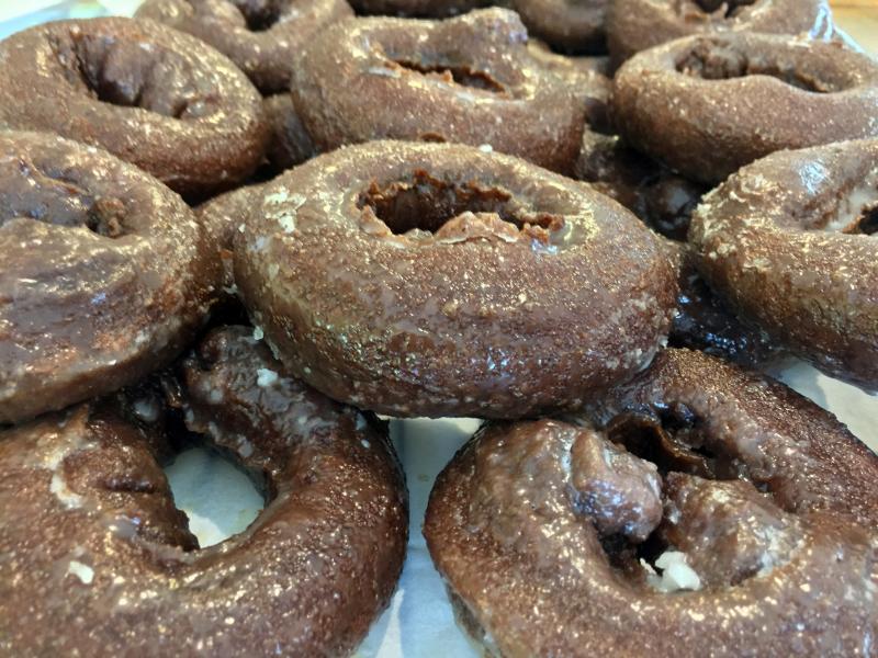 Chocolate glazed donuts from Baker’s Way in Boothbay Harbor. SUZI THAYER/Boothbay Register